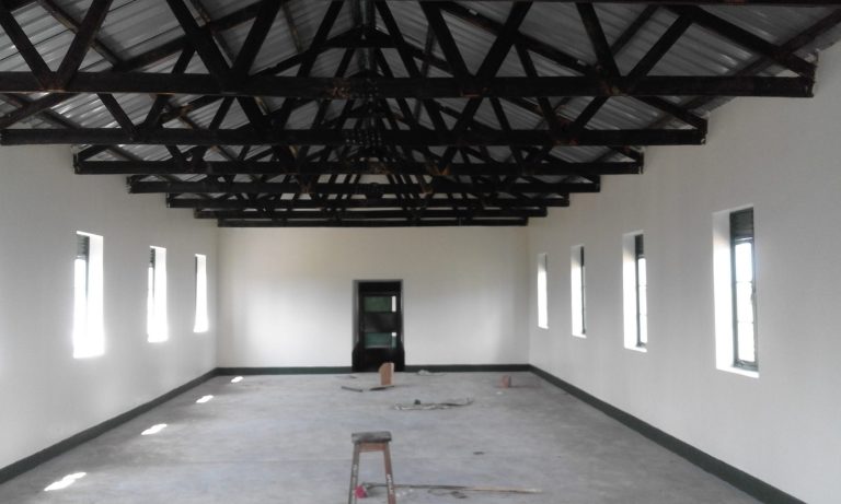 Interior of the new dormitory with steel roof trusses
